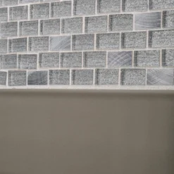 Crystal Ice Metallic 11.875 in. x 11.875 in. Interlocking Mixed Glass and Metal Mosaic Tile (9.79 sq. ft./Case) by Jeffrey Court -The Elite Tile Sales Store metallic jeffrey court glass tile 99350 a0 1000